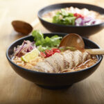 A bowl of chicken chilli ramen noodles